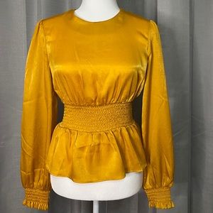 Long sleeve peplum blouse